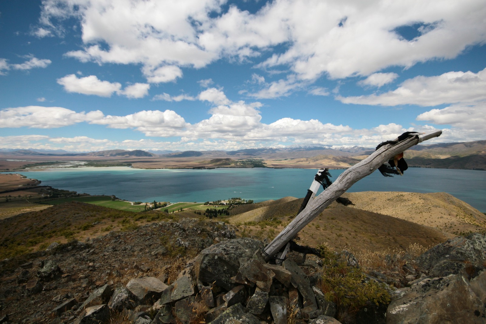 view from the top of a hill above lake benmore, canterbury, new zealand