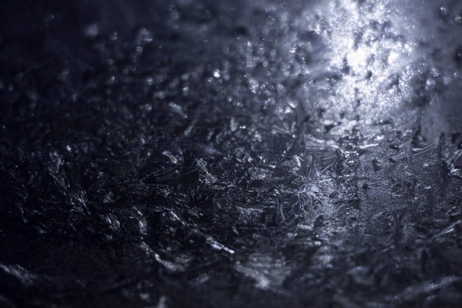 ice frozen on a car windshield